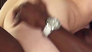 Busty brunette MILF is bouncing on black dong