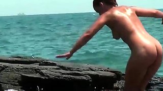 Busty girls at beach hidden cam