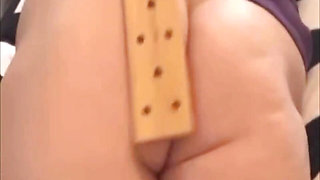 A young virgin spanks herself