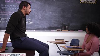 Gorgeous ebony schoolgirl with curly hair gets fucked pretty hard right in the classroom