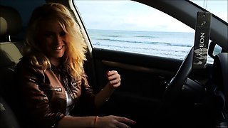 Sweet girl with big tits drives herself to climax in the car