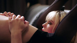 Blonde's tongue flicked against the excited clit of a hairy pussy