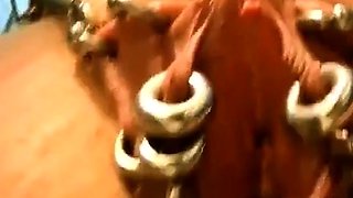 Slave M nipple stretching