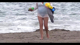 My Wife, a Beautiful 58-year-old on the Beach, Shows off and Masturbates with Hers