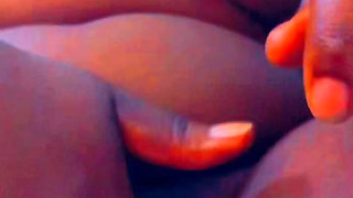 Masturbating