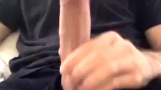 Muscular amateur strokes his big hard cock with a thick bell