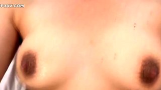 Young wife with milk just after giving birth, overflowi