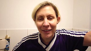 Blonde Sporty MILF Pisses in a Cup Wearing a Sports Jersey, Then Her Man Drinks the Piss