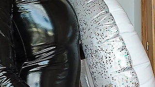Latex Catsuit and Swimming Ring Masturbation