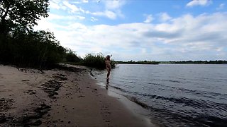 Exhibitionist Blonde Goes Nude on a River Beach
