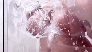 Slutty amateur flashing her big boobs in the backseat