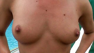 Blonde chick Sophie Moone sticks a pink dildo in her shaved pussy