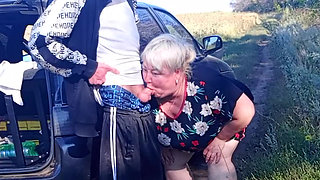 Stepmom holds my dick while I pee and then sucks it in public