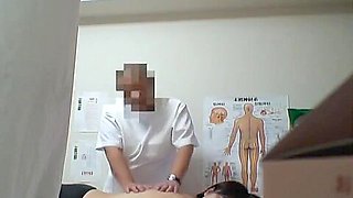 Asian cutie is with her hairy cunt under voyeur massage
