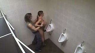 Horny babe fucked in the men's room!