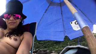 First-time Nudist Hesitates to Undress on Beach