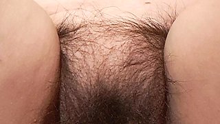 Masturbating with Vibrator on Mature Clitoris