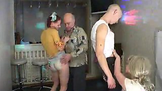 Old and young Russian couple enjoy group sex