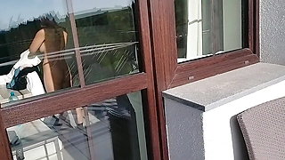 dickflash for the neighbor girl through the window on the balcony she comes out, shows her tits and touches her dick