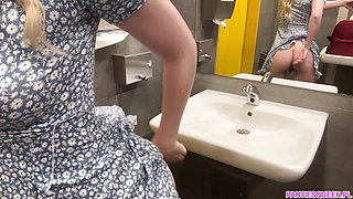 Blonde in short dress masturbates pumped pussy in public restaurant and pisses in McDonald's toilet room