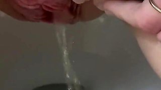 She pees in the toilet beautiful beautiful golden shower on toilet
