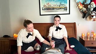 Double handjob service provided by naughty schoolgirls