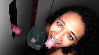 Cum addicted ebony slut sucks off multiple gloryhole cocks