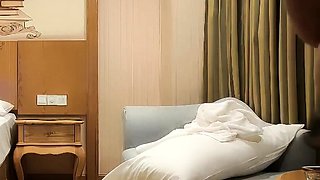 Cute amateur asian web cam girl playing with her toy