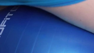 MILF in Sports Skirt Teases Tight Ass on Fitness Ball