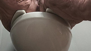 She's Enjoying Rubbing Her Pussy on the Toilet