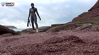 Wetsuit Giantess Finds a Tiny Toy to Tease