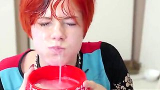 Redhead slut drinks cum and licks man's ass