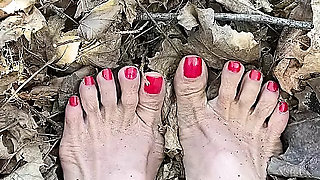 Melove Sexy Small Feet with Red Toe Nails in Leaves