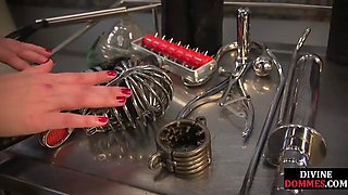Dominatrix inserts objects on incels ass