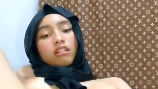Horny Black Hijab Masturbates Until Her Pussy Is Wet