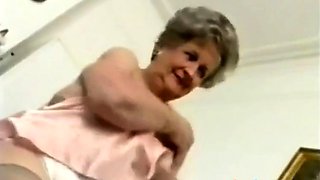 Big-Titted Granny Strips and Plays at Home