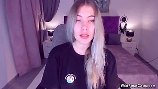 Big tits teen spreads pussy