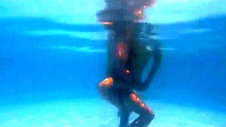 Busty milf goes skinny dipping and gets dicked down in a pool
