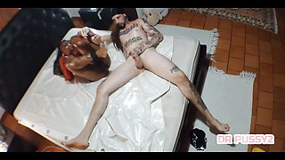 African Girl Is Handcuffed by the Feet and Fucked in the Pussy Insanely with Her Body Covered in Oil and Riding Hard on the Tatt