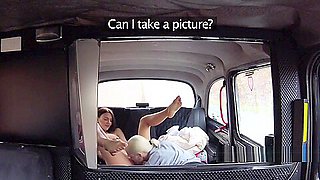 Busty pierced blonde licked in fake taxi