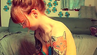 Amateur redhead Jacqueline with glasses masturbates