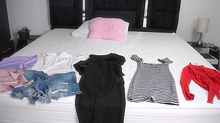 Girl choosing the outfit of the day