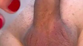 A beautiful sissy masturbates and vibrates her big cock until spiting a big load