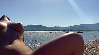 SHE CLIMBED INTO HIS LAP RIGHT ON THE BEACH WITH A SUNLIGHT ON HER SKIN