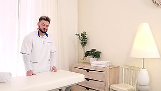 Tattooed blonde with a flexible body fucks after a massage