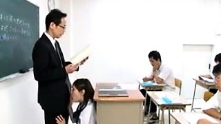 Naughty Japanese teen in school uniform sucks cock