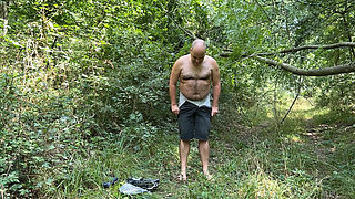 Zolee undresses in the forest and then cums
