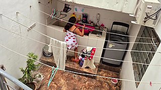 The Neighbor Is Watched Washing Clothes by Her Neighbor