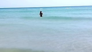 Nudist Beach Fun: Hot Girl Helps Guy Jerk Off in Public