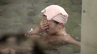 Naked Asian girlie is bathing in the sauna pool on nri110 00